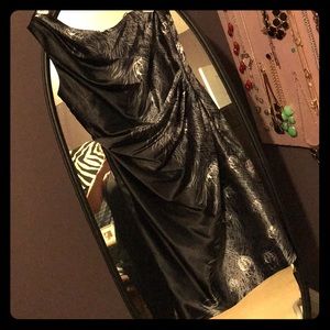 One shoulder black with silver peacock print.